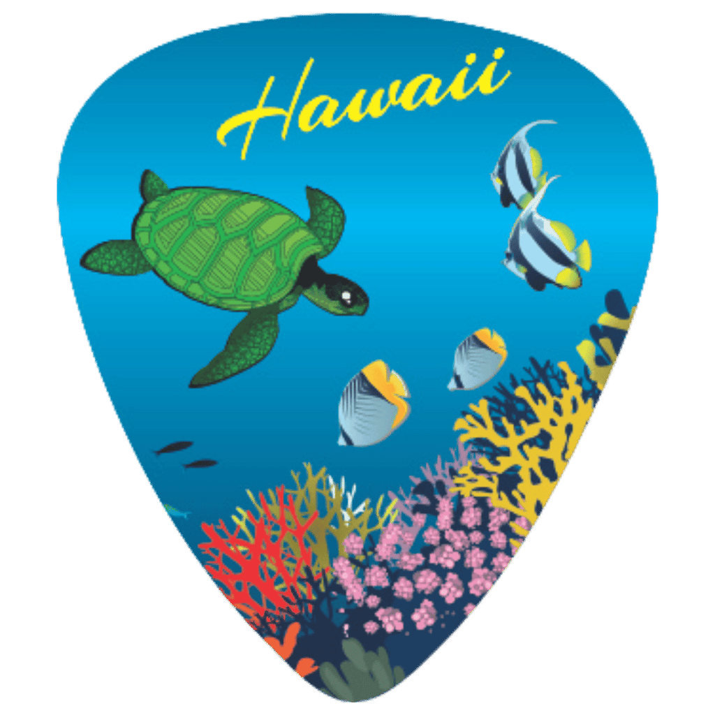 A guitar pick shaped like an underwater ocean scene with a green sea turtle, striped fish, coral reef, and the word "Hawaii" in yellow script at the top, shown on a plain white background.