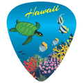 A guitar pick shaped like an underwater ocean scene with a green sea turtle, striped fish, coral reef, and the word "Hawaii" in yellow script at the top, shown on a plain white background.