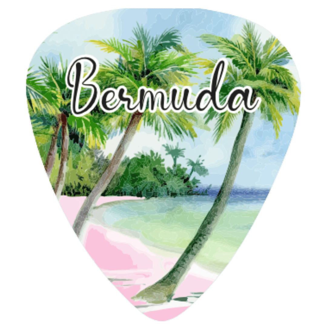 A guitar-pick-shaped sticker or decal featuring a watercolor illustration of a tropical beach with palm trees, turquoise water, pink sand, and the word “Bermuda” in large white script across the center.