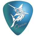 A blue guitar pick featuring a white marlin graphic and the word 'Guam' in cursive script, shown on a plain white background.