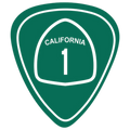 A green and white shield-shaped sticker or patch featuring the text 'CALIFORNIA' and the number '1' in the center, isolated on a white background.