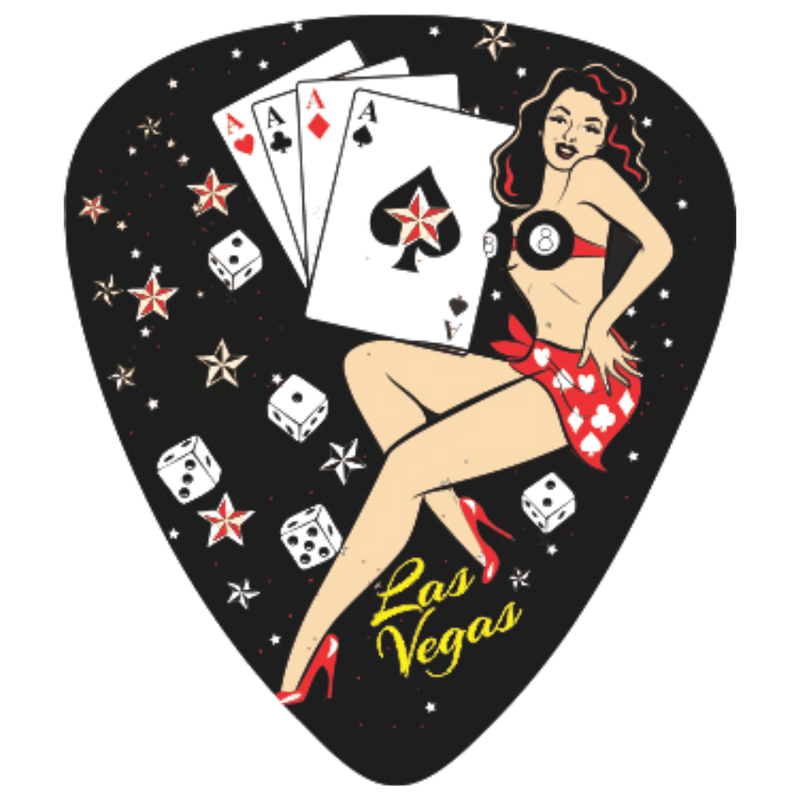 A black guitar pick featuring a pin-up style illustration of a woman in a red bikini and red high heels, holding four aces, with dice, stars, and the words 'Las Vegas' on a black background.