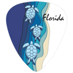 A guitar pick-shaped graphic featuring three illustrated sea turtles swimming in layered blue water, with a sandy beige shoreline and the word 'Florida' in black script on a white background.