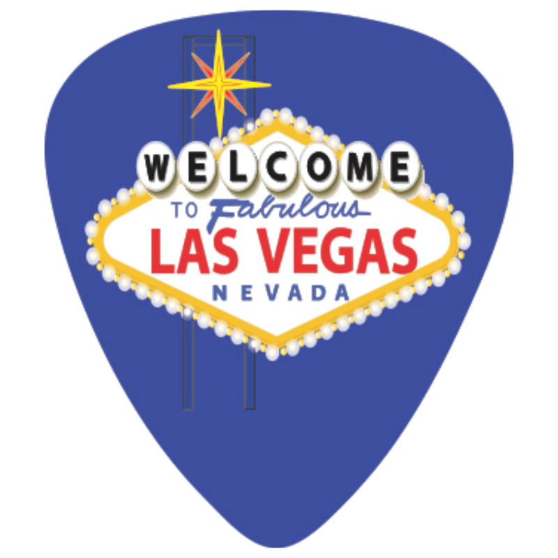 A blue guitar-pick-shaped sign featuring the 'Welcome to Fabulous Las Vegas Nevada' design with a yellow star, white and red lettering, and a pearl-bordered diamond outline on a plain white background.